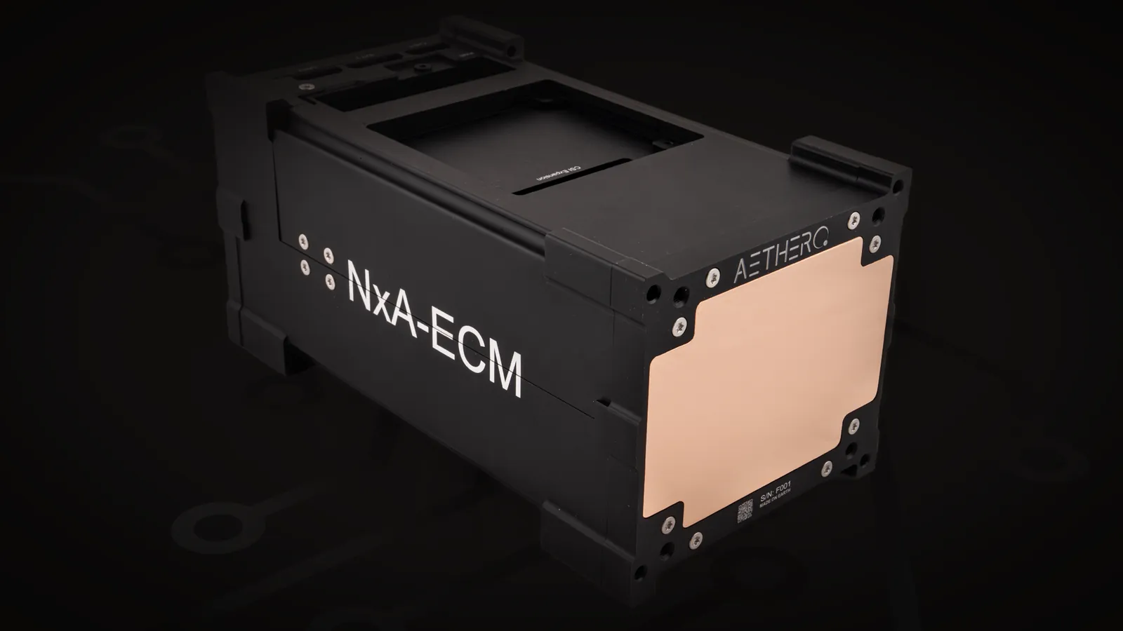 NxA-ECM enclosure showing copper plate and I/O face